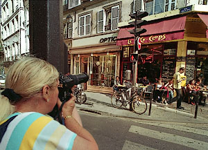 A photography student taking pictures in Paris.