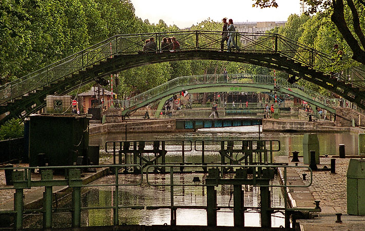 A long-distance view of locks and bridges over canal Saint-Martin.