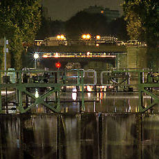 The «écluses des Morts» locks of canal Saint-Martin at night.