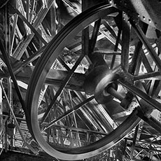 Elevator pulleys inside one of the pylons of the Eiffel Tower.