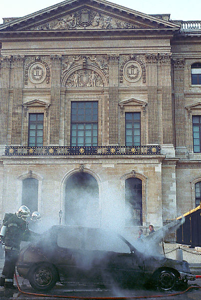 The aftermath of a car fire next to the Louvre Museum.