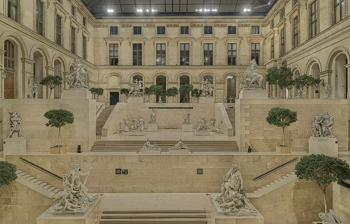 The cour Marly in the Richelieu wing of the Louvre Museum at night.