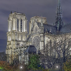 Notre-Dame Cathedral seen from the Left Bank at night.