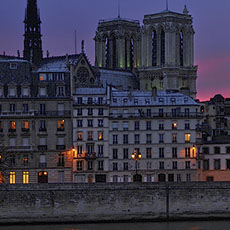 Notre-Dame and the north side of île de la Cité at night.