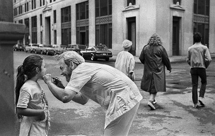 An impromptu dental exam on Broad Street in Boston’s Financial District.