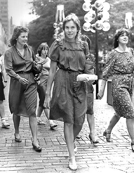 Secretaries heading out for lunch in Faneuil Hall Marketplace, Boston.