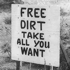 A sign saying dirt is free in Alabama.