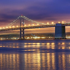 The Bay Bridge in San Francisco at night.