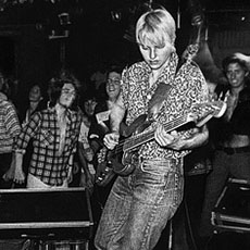 Aimee Mann, Doug Vargas and Dave Bass Brown of The Young Snakes on stage at the Rat in Kenmore Square.