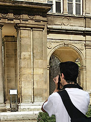 A photographer taking pictures in Paris.
