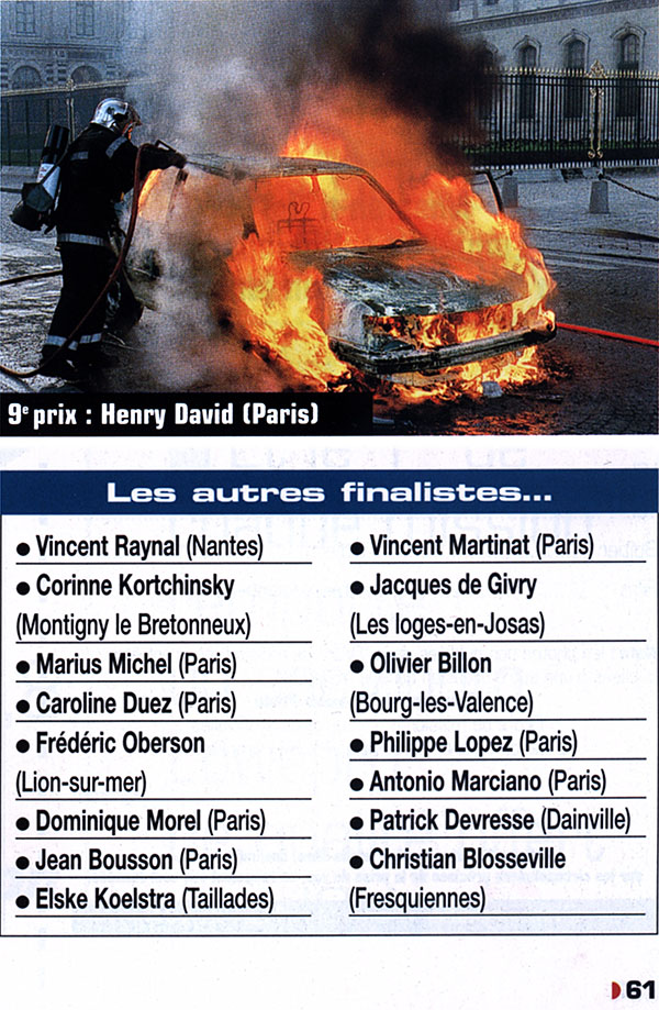 A burning car next to the musée du Louvre.