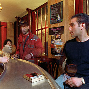 People inside a bar in Belleville, Paris.